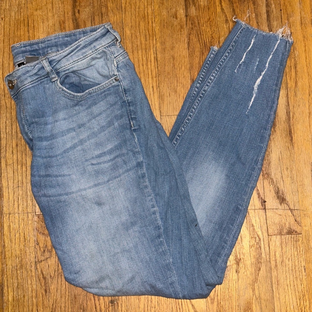 Light blue wash H&M distressed denim skinny jeans - size 12